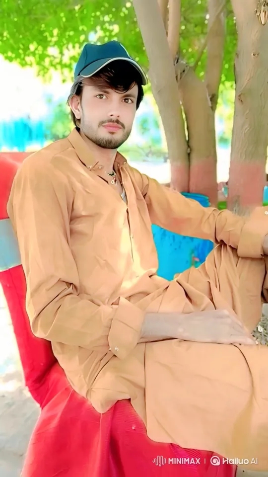 Young Man in Nature, Expressing Contentment – AI Generated Video | Hailuo AI