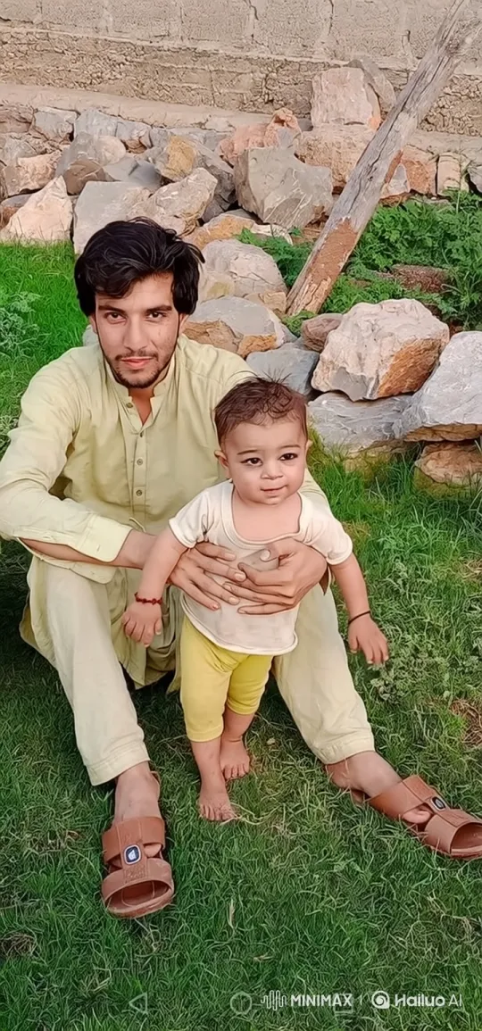 Affectionate Moment Between Man and Baby in Nature – AI Generated Video | Hailuo AI