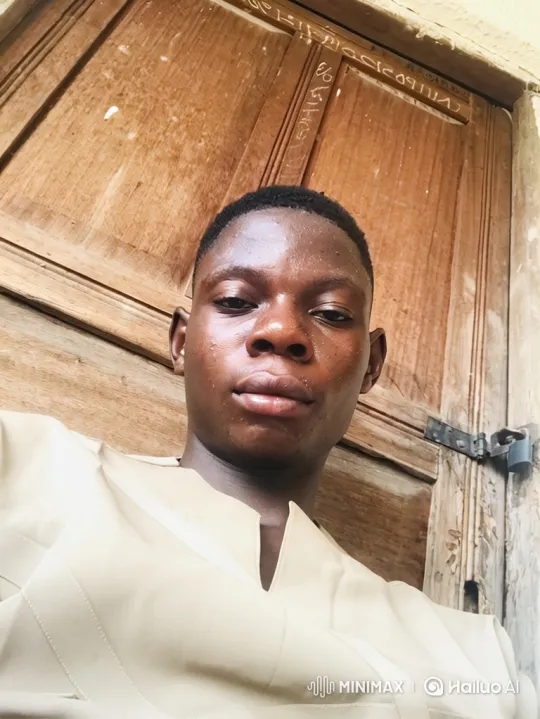 Young Black Man Poses Proudly in Front of His Home – AI Generated Video | Hailuo AI