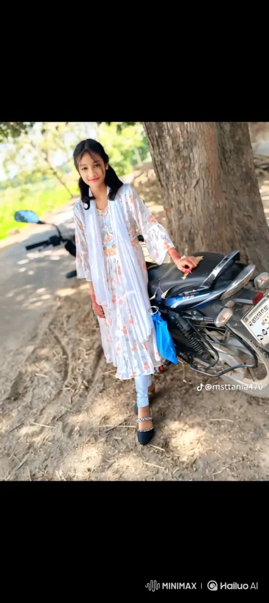Young Woman Smiles on Dusty Path by Motorcycle – AI Generated Video | Hailuo AI