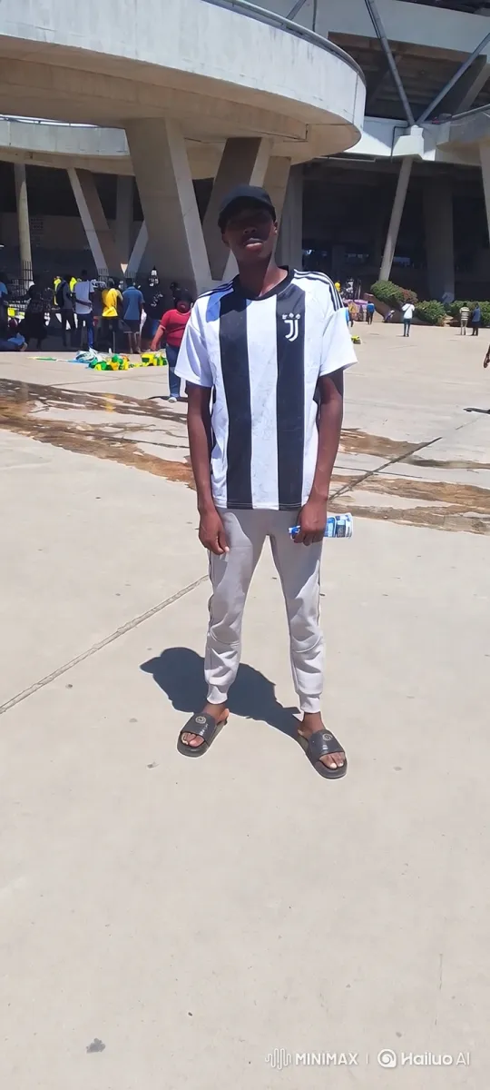 Young Man in Stadium Setting: A Cinematic Tracking Shot – AI Generated Video | Hailuo AI