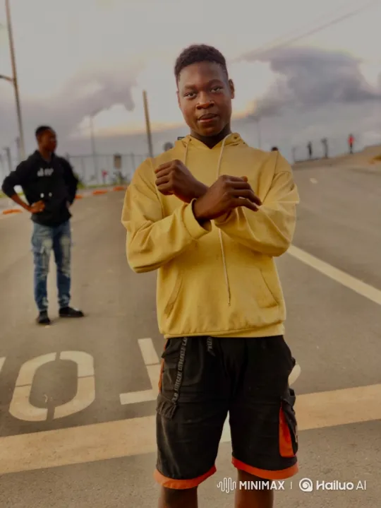 Young Man Reflects in Sunset Paved Road Scene – AI Generated Video | Hailuo AI