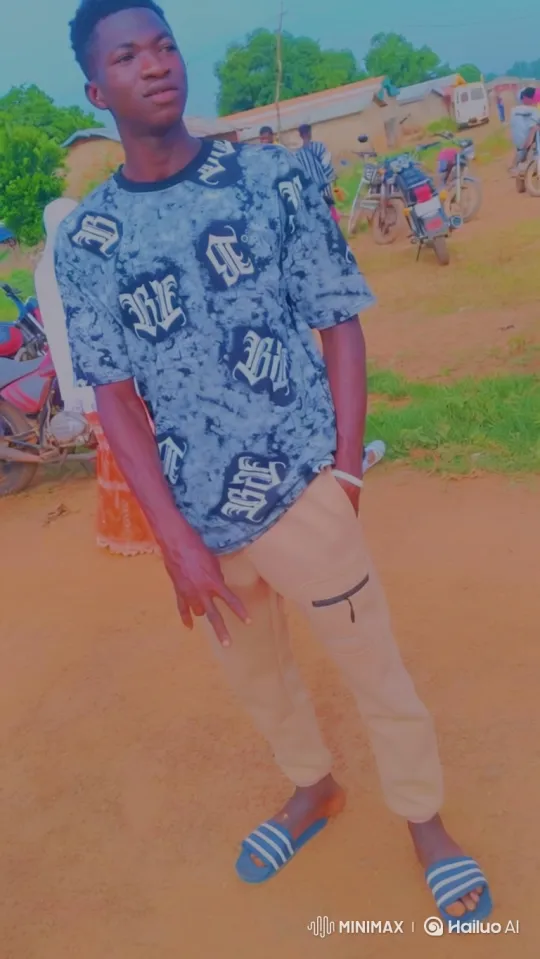 Young Man on Dirt Path in Village Setting – AI Generated Video | Hailuo AI