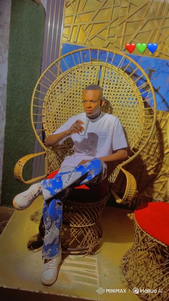 Stylish Young Man Sips Drink in Ornate Chair – AI Generated Video | Hailuo AI