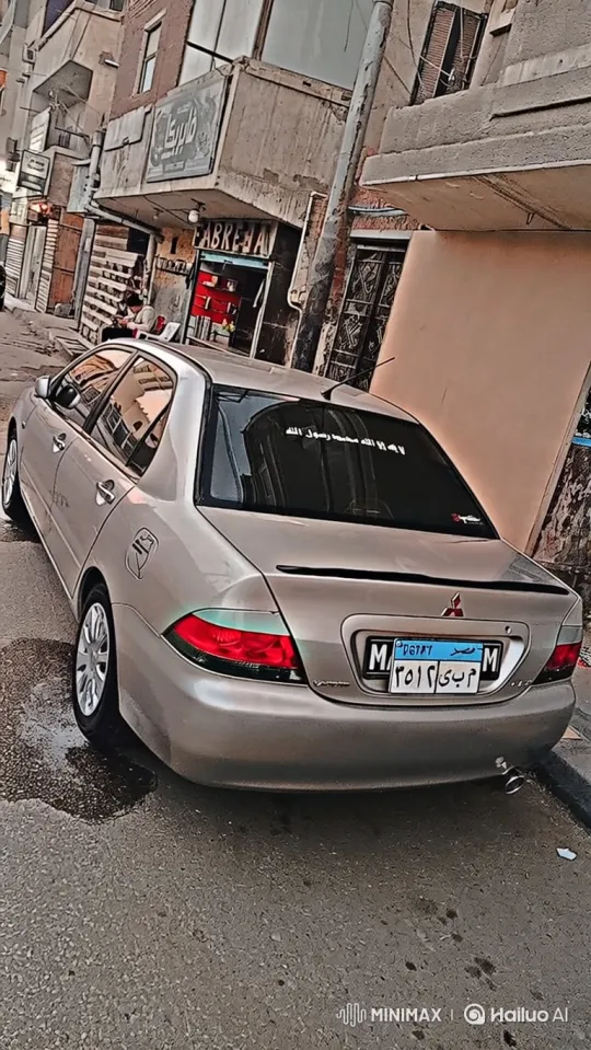 Silver Sedan Demonstrates Air Suspension Lowering and Raising – AI Generated Video | Hailuo AI