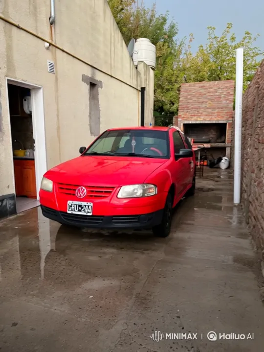 Red Car's Air Suspension Lowering on Wet Driveway – AI Generated Video | Hailuo AI