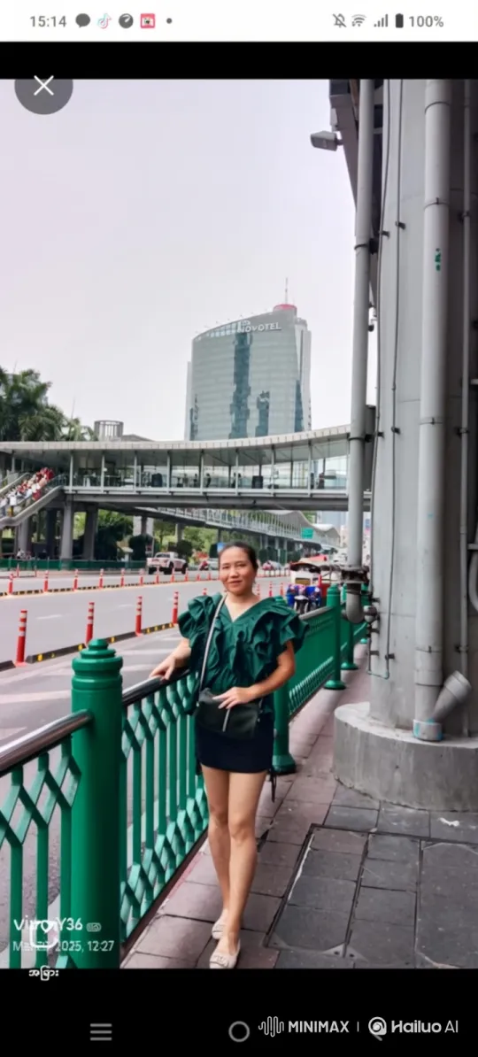 Asian Woman on Sidewalk Amidst City Life – AI Generated Video | Hailuo AI