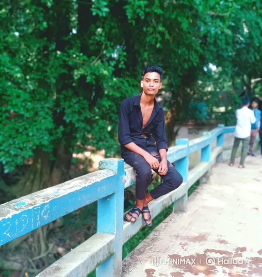 Young Man Contemplates on a Forest Bridge – AI Generated Video | Hailuo AI