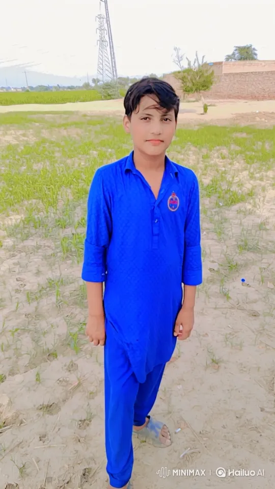 Young Boy in a Rural Field with Gentle Movements – AI Generated Video | Hailuo AI