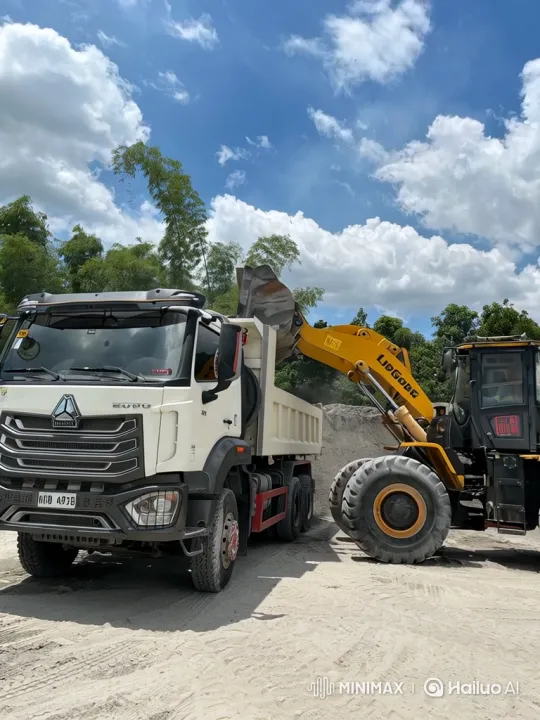 Construction Scene: Loader Transferring Gravel to Truck – AI Generated Video | Hailuo AI