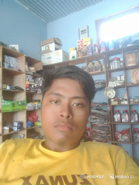 Young Man in Yellow T-Shirt at Auto Parts Store – AI Generated Video | Hailuo AI