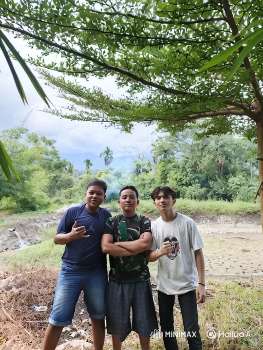 Three Youths Pose in Nature, Camera Ascends to Earth from Space – AI Generated Video | Hailuo AI