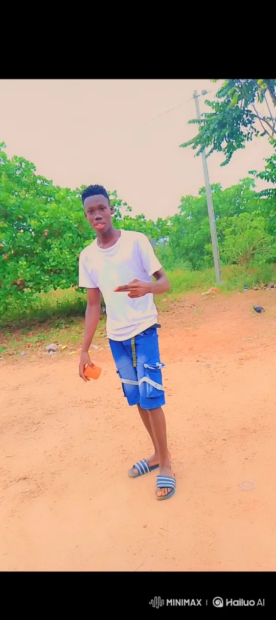 Young Man Observes Electric Truck on Dirt Road – AI Generated Video | Hailuo AI