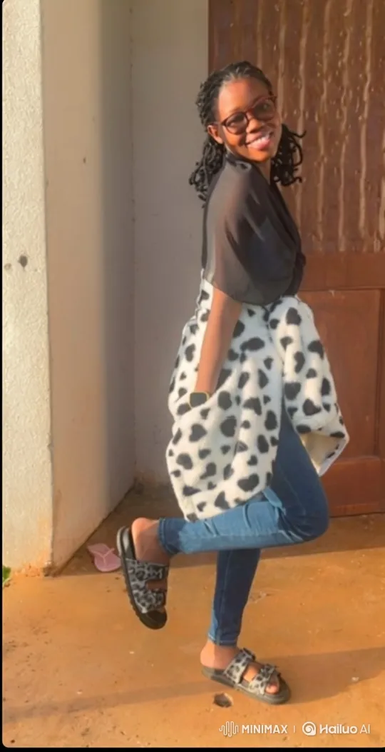 Young Woman Smiles Warmly in Sunlit Outdoor Scene – AI Generated Video | Hailuo AI