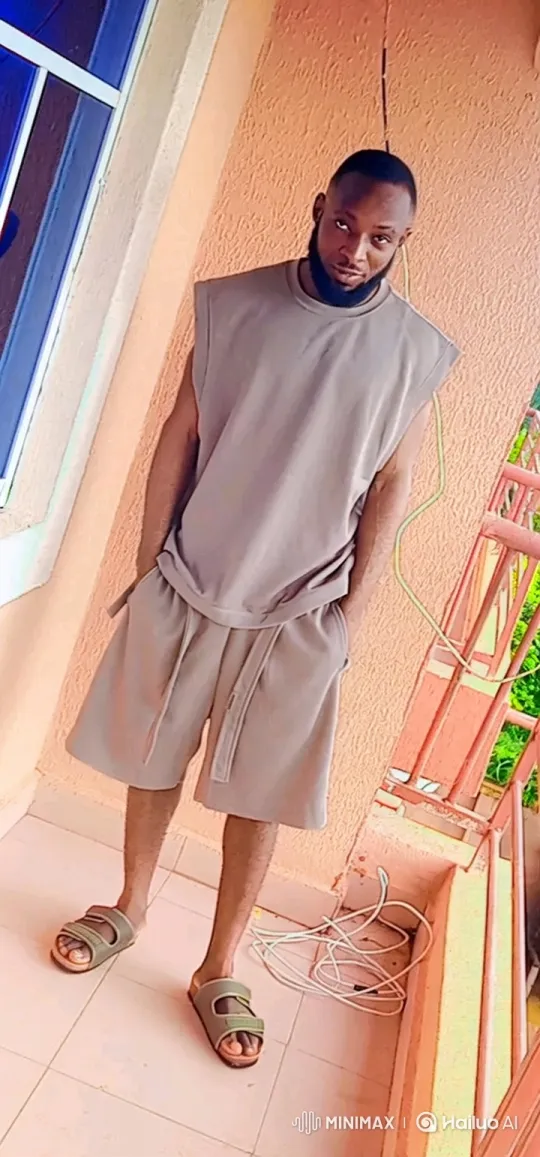 Man in Beige Clothing Nods Gently on Balcony – AI Generated Video | Hailuo AI