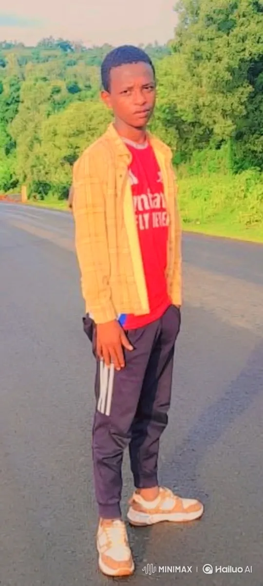 Young Man Contemplates Walk on Empty Road – AI Generated Video | Hailuo AI