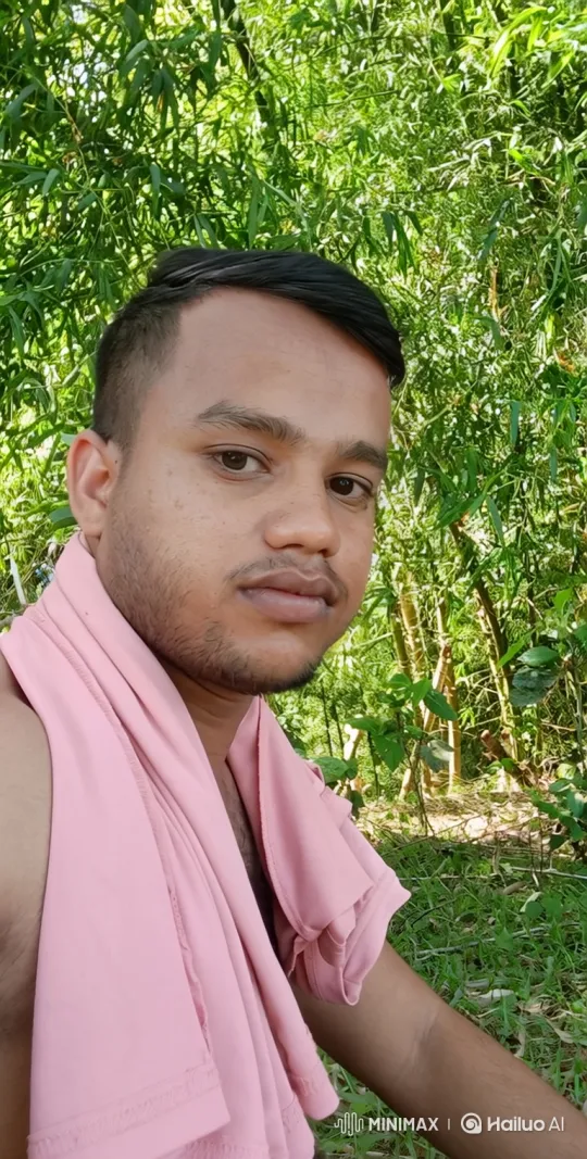 Young Man Greet Viewers in Bamboo Grove Setting – AI Generated Video | Hailuo AI