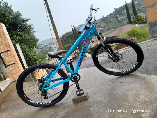 Blue Bicycle Sinks Slowly on Wet Pavement – AI Generated Video | Hailuo AI