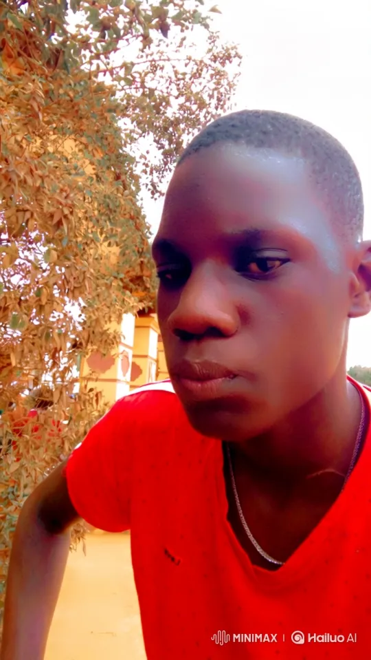 Contemplative Young Man in Autumnal Setting – AI Generated Video | Hailuo AI