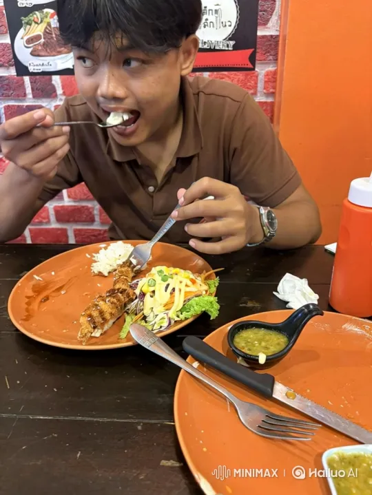 Young Man Eats Entire Meal and Utensils – AI Generated Video | Hailuo AI