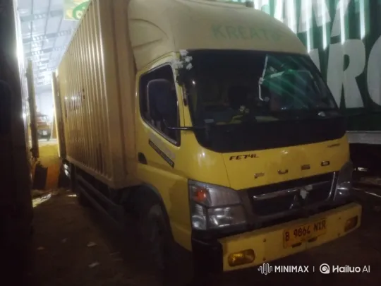 Yellow Mitsubishi Fuso Truck Navigates Rainy Highway – AI Generated Video | Hailuo AI