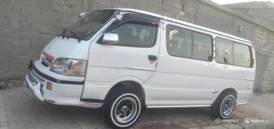 White Van Lowering with Custom Wheels and Chrome – AI Generated Video | Hailuo AI