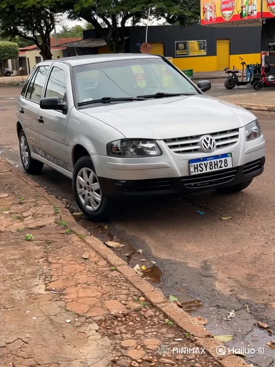 Silver Hatchback Lowering on Street with Background Trees – AI Generated Video | Hailuo AI
