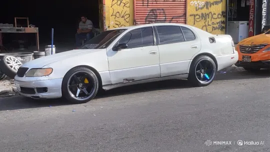 White Sedan's Air Suspension Lowering Demonstration – AI Generated Video | Hailuo AI