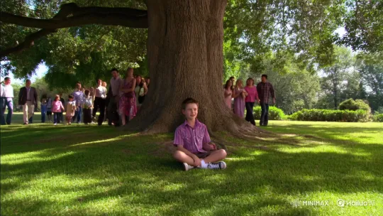 Joyful Young Singer Enchants Crowd Under Tree – AI Generated Video | Hailuo AI