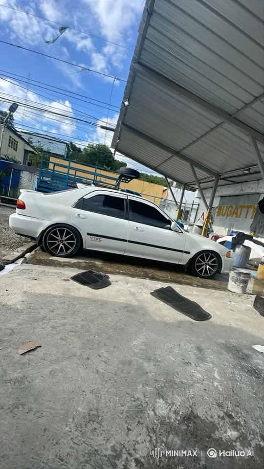 White Modified Sedan Showcased in Industrial Setting – AI Generated Video | Hailuo AI