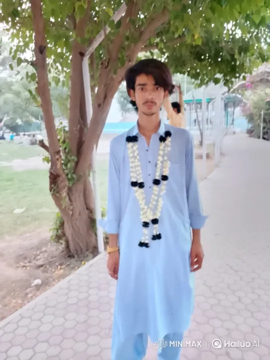 Man in Tunic Stands Still as Camera Moves in Park – AI Generated Video | Hailuo AI