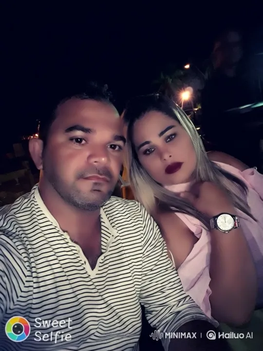 Couple's Subtle Poses and Smiles Captured in Night Selfie – AI Generated Video | Hailuo AI