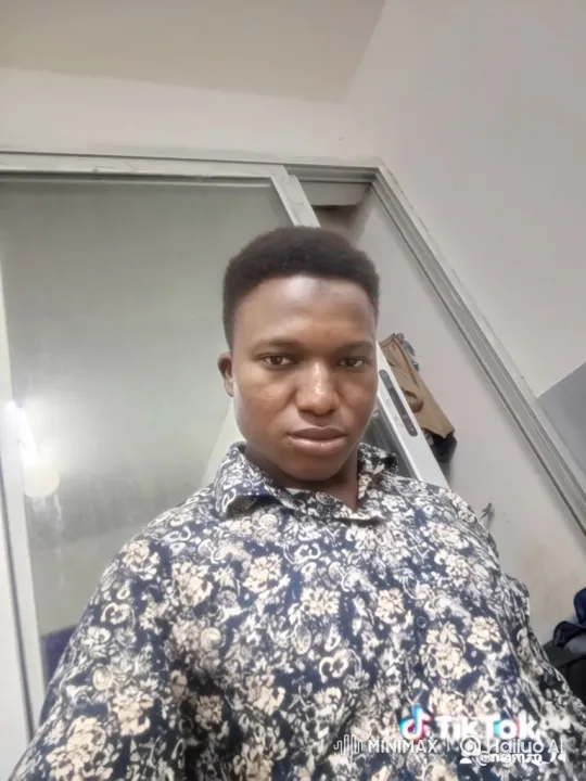 Young Man Maintains Steady Gaze During Complex Camera Move – AI Generated Video | Hailuo AI