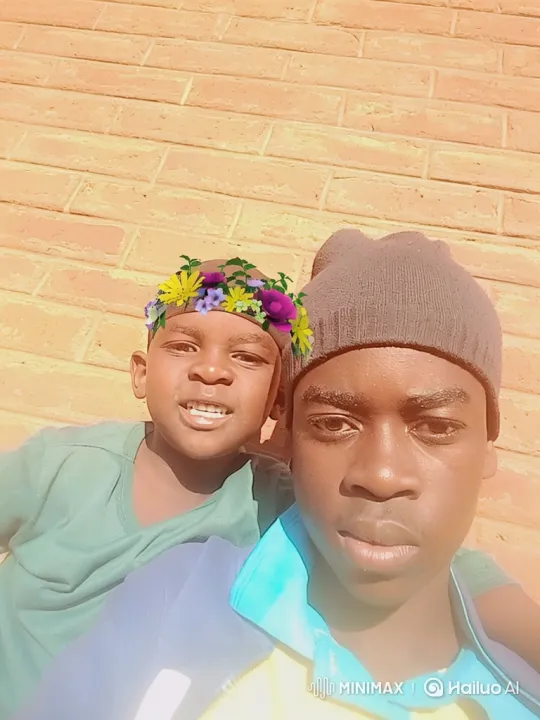 Sunlit Portrait of Two Youths with Bright Smiles – AI Generated Video | Hailuo AI