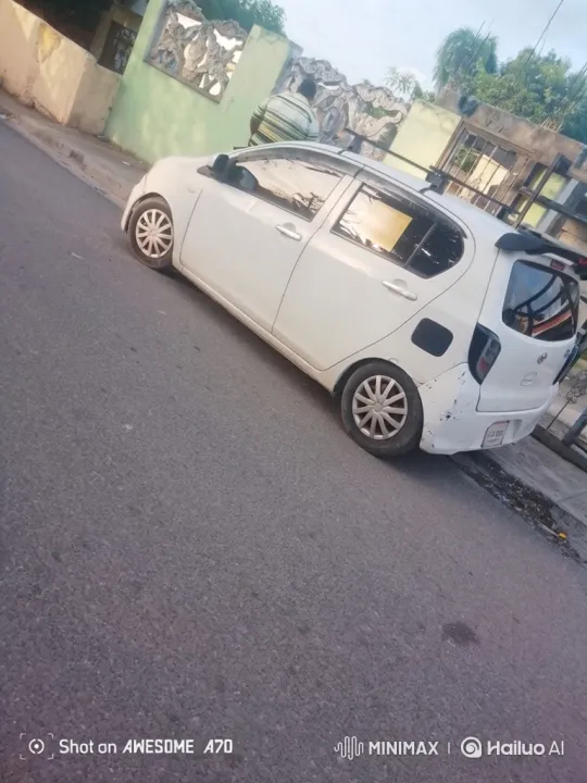 White Hatchback Lowering Its Suspension Smoothly – AI Generated Video | Hailuo AI