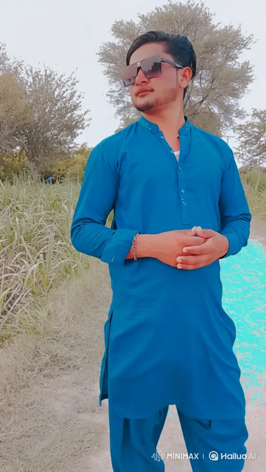 Rural Path: A Young Man's Journey in Blue – AI Generated Video | Hailuo AI