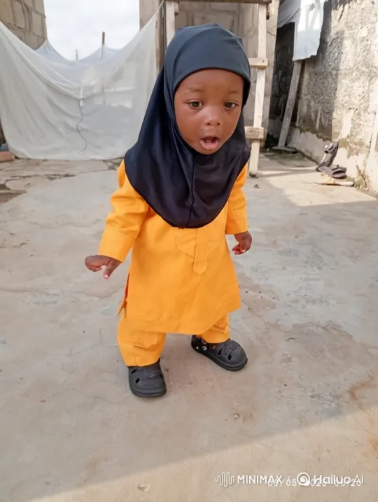 Toddler Takes First Steps in Outdoor Patio Setting – AI Generated Video | Hailuo AI