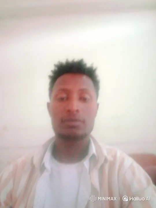 Young Man in Car, Steady Gaze, Moving Landscape – AI Generated Video | Hailuo AI