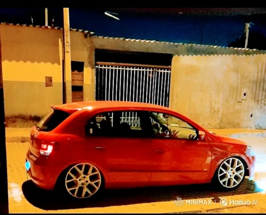 Red Hatchback Drives Away Under Streetlight – AI Generated Video | Hailuo AI