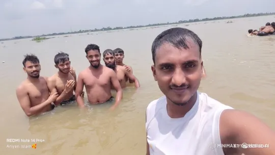 Young Men Enjoy River Swim, Spot Helicopter in Sky – AI Generated Video | Hailuo AI