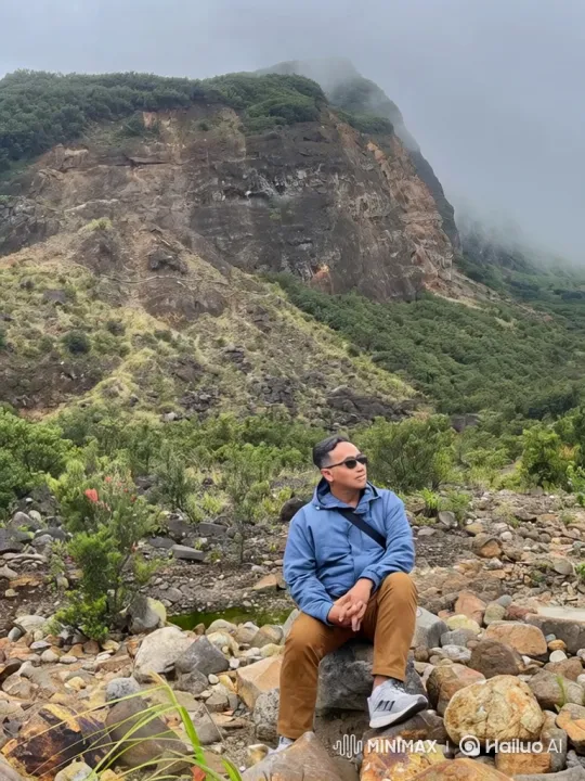 Man Contemplating on Rock, Earth Revealed from Space – AI Generated Video | Hailuo AI