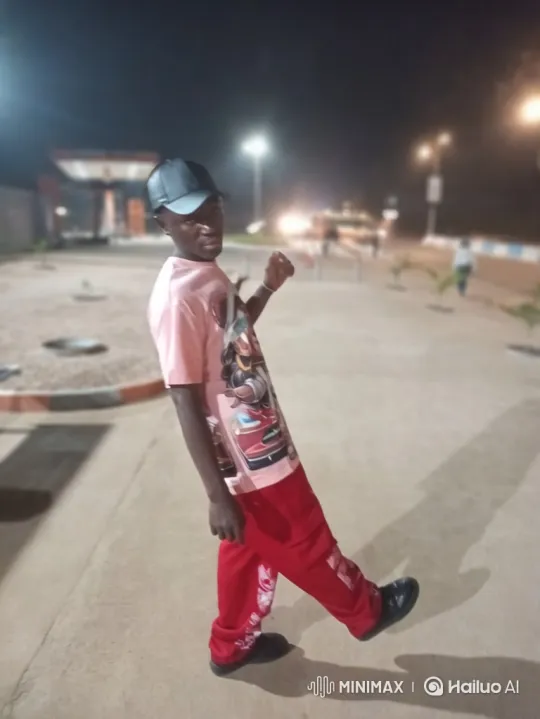 Young Man Poses and Walks Confidently at Night – AI Generated Video | Hailuo AI