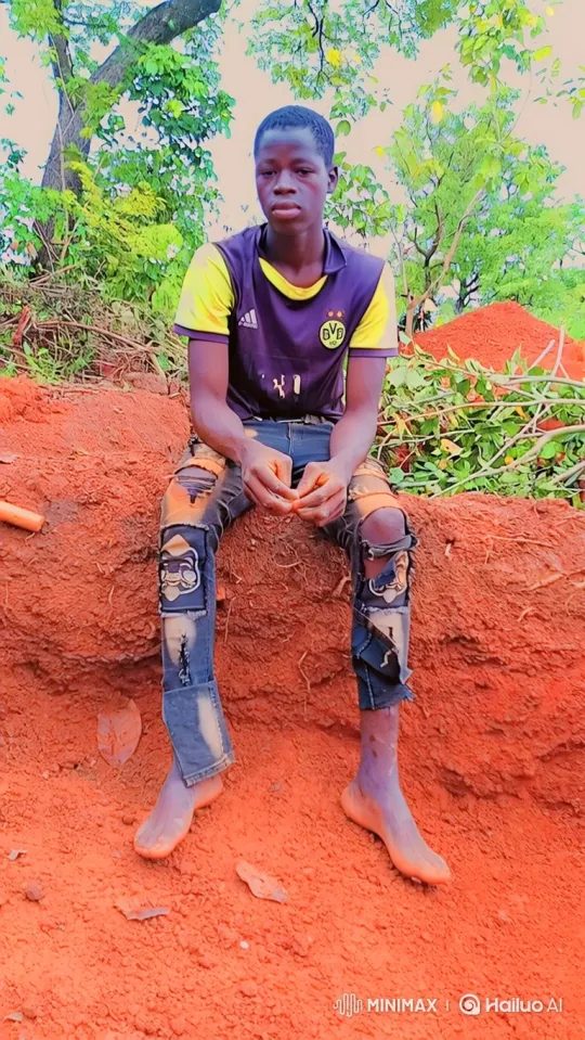 Young Man Reflects in Nature, Soccer Jersey, Earthy Setting – AI Generated Video | Hailuo AI