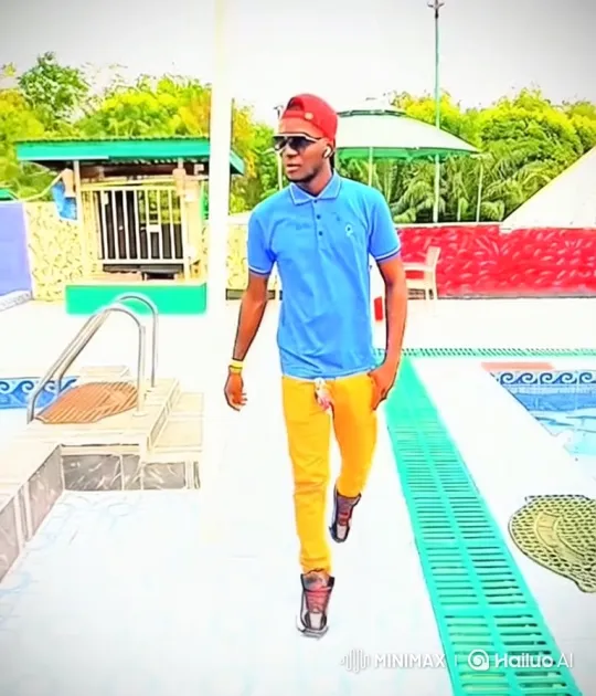 Young Man Walks confidently along the edge of the swimming pool – AI Generated Video | Hailuo AI