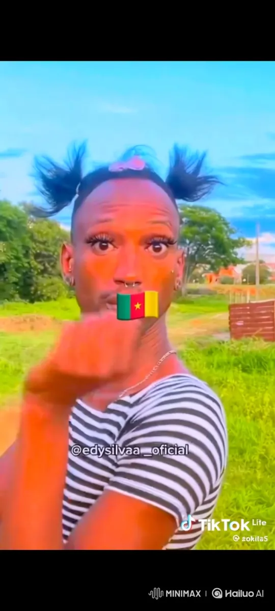 Cameroon Flag Emoji on Person with Horse in Sunny Field – AI Generated Video | Hailuo AI