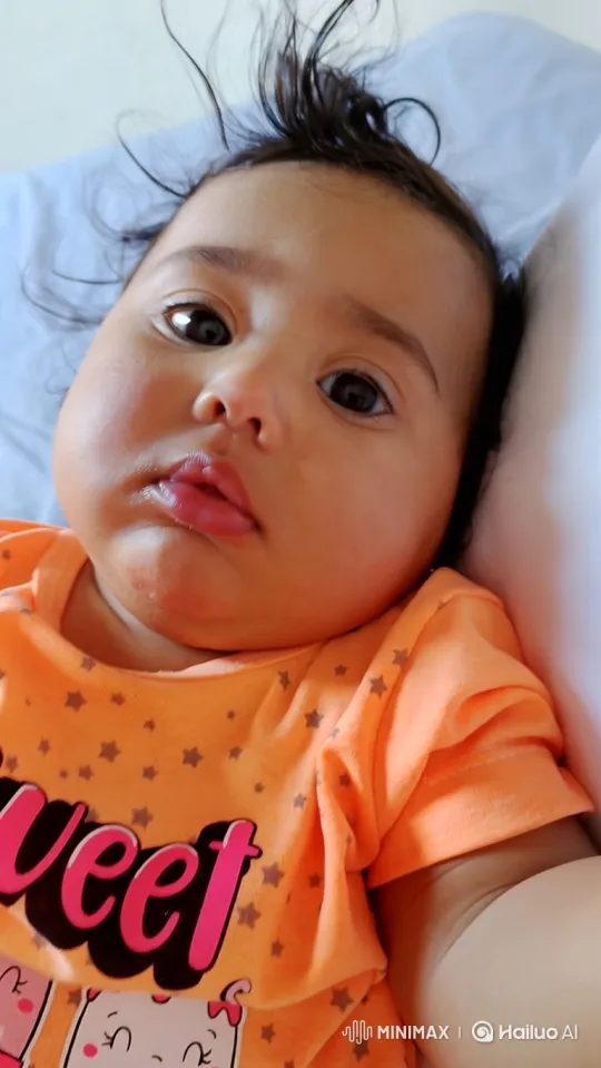 Baby's Subtle Smile and Serene Gaze – AI Generated Video | Hailuo AI