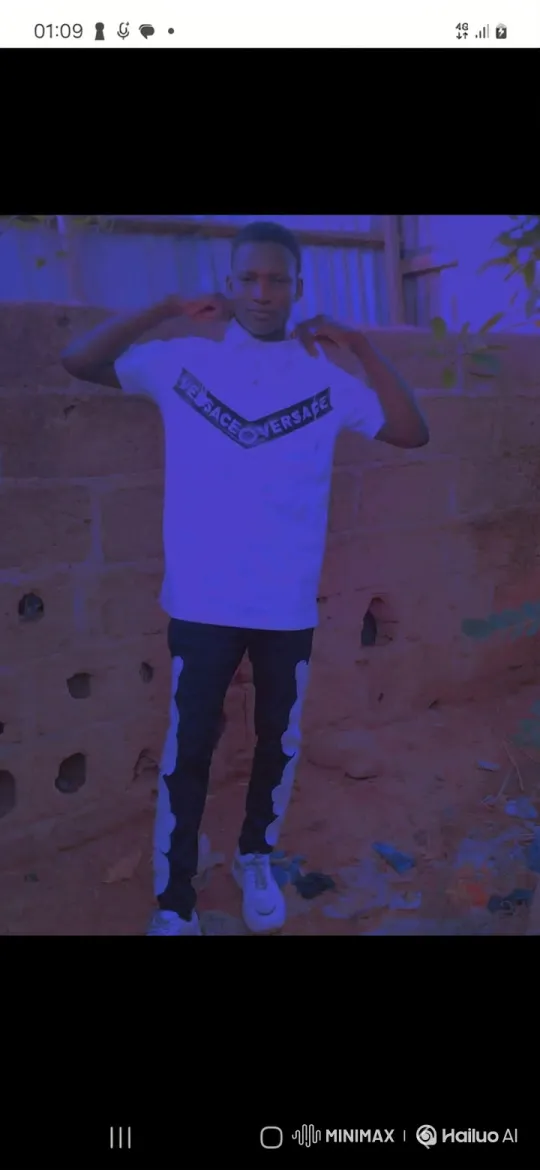Young Man Poses Confidently in Colorful Outdoor Setting – AI Generated Video | Hailuo AI