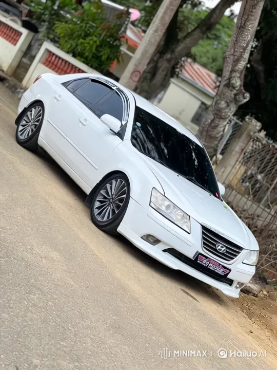 Stunning White Sedan Glides Through Tree-Lined Street – AI Generated Video | Hailuo AI