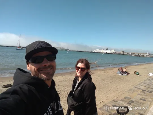 Couple's Serene Beach Selfie with Coastal Scenery – AI Generated Video | Hailuo AI