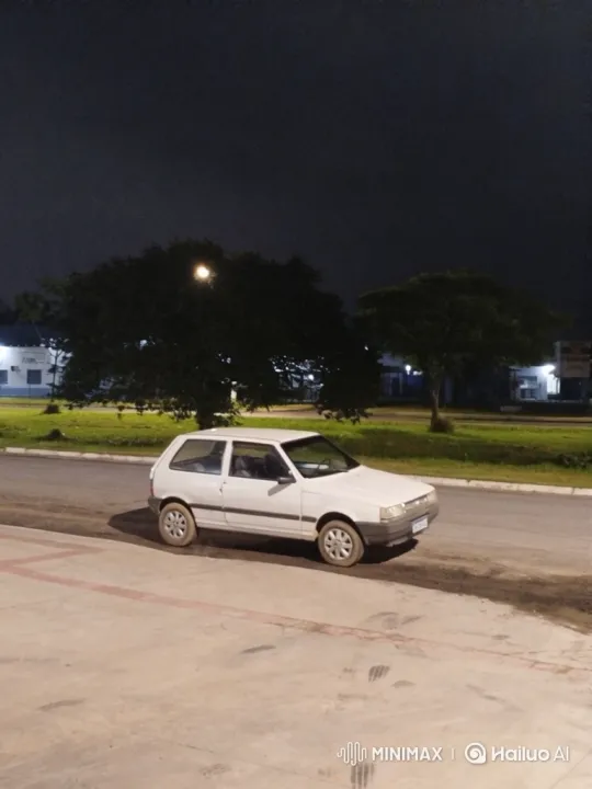 White Hatchback Lowering Simulation at Night – AI Generated Video | Hailuo AI
